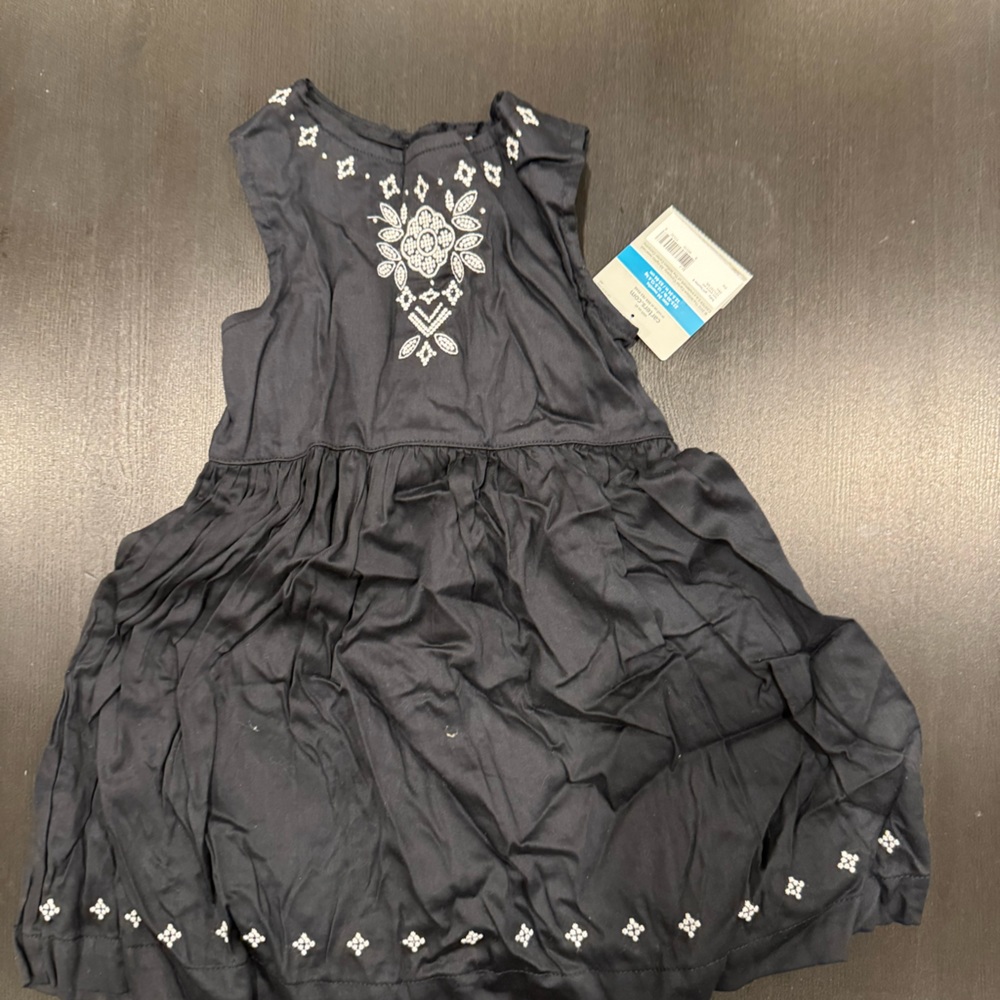 Cute black dress and pink/zebra print set.